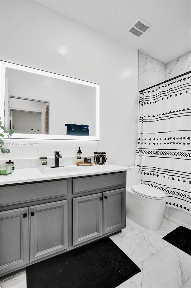 11898 SW 25th Ct Unit 103, Miramar, FL 33025 - bathroom with marble finish flooring, vanity, and a shower with curtain