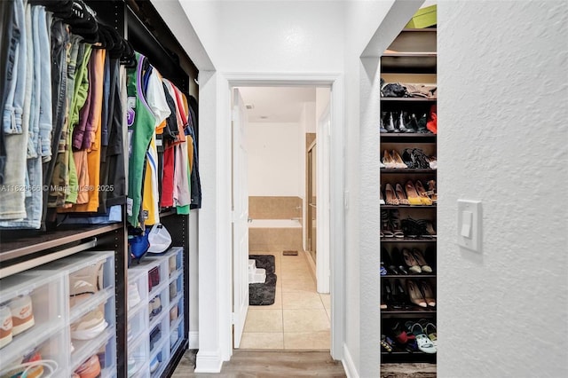 11898 SW 25th Ct Unit 103, Miramar, FL 33025 - walk in closet with tile patterned flooring
