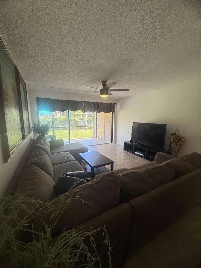 2371 SW 15th St Unit 101, Deerfield Beach, FL 33442 - living room featuring a textured ceiling and ceiling fan