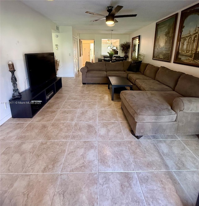 2371 SW 15th St Unit 101, Deerfield Beach, FL 33442 - living room featuring ceiling fan and light tile patterned floors