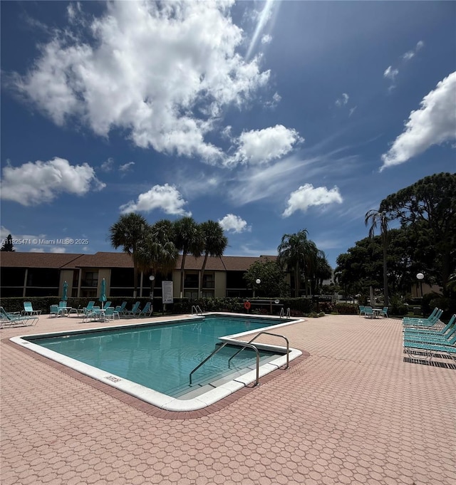 2371 SW 15th St Unit 101, Deerfield Beach, FL 33442 - community pool featuring a patio