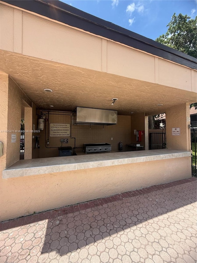 2371 SW 15th St Unit 101, Deerfield Beach, FL 33442 - view of patio featuring area for grilling
