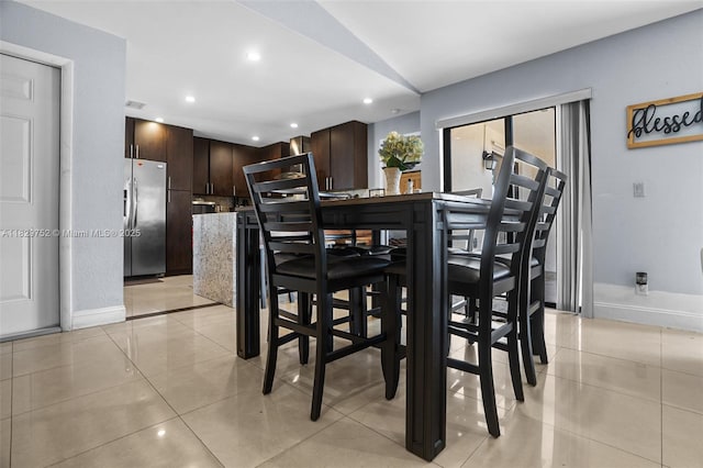 17625 NW 62nd Ct, Hialeah, FL 33015 - dining room featuring light tile patterned flooring, recessed lighting, and lofted ceiling