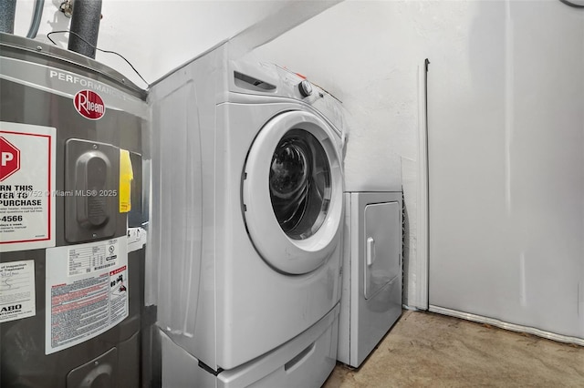 17625 NW 62nd Ct, Hialeah, FL 33015 - washroom featuring washing machine and clothes dryer and electric water heater