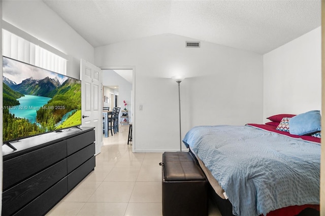 17625 NW 62nd Ct, Hialeah, FL 33015 - bedroom featuring lofted ceiling, light tile patterned flooring, and a textured ceiling
