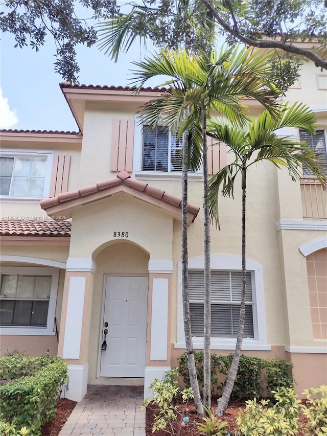 8380 SW 25th Ct Unit 104, Miramar, FL 33025 - view of front of property featuring stucco siding and a tile roof