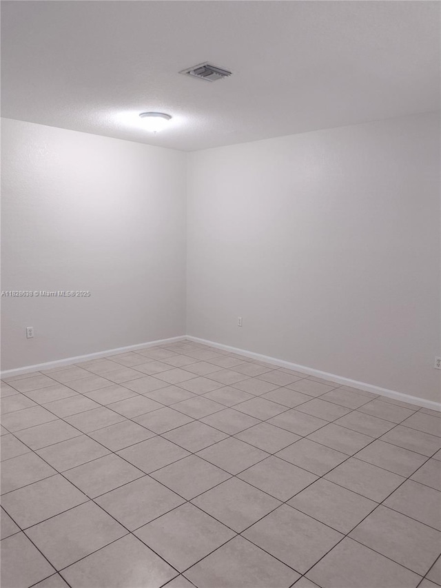 8380 SW 25th Ct Unit 104, Miramar, FL 33025 - spare room featuring baseboards