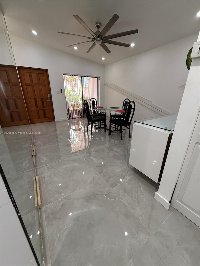 7440 SW 153rd Ct Unit 107-4, Miami, FL 33193 - dining area with light marble finish flooring, ceiling fan, vaulted ceiling, and recessed lighting