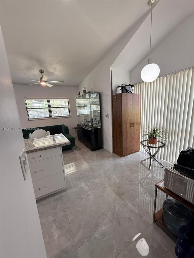 7440 SW 153rd Ct Unit 107-4, Miami, FL 33193 - living room featuring a ceiling fan and light marble finish flooring