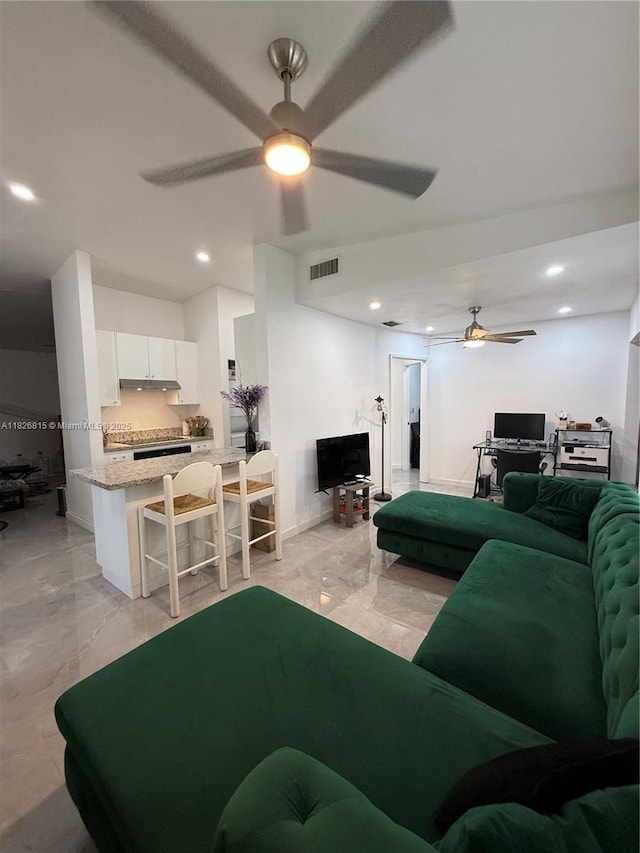 7440 SW 153rd Ct Unit 107-4, Miami, FL 33193 - living room featuring a ceiling fan, light marble finish flooring, and recessed lighting