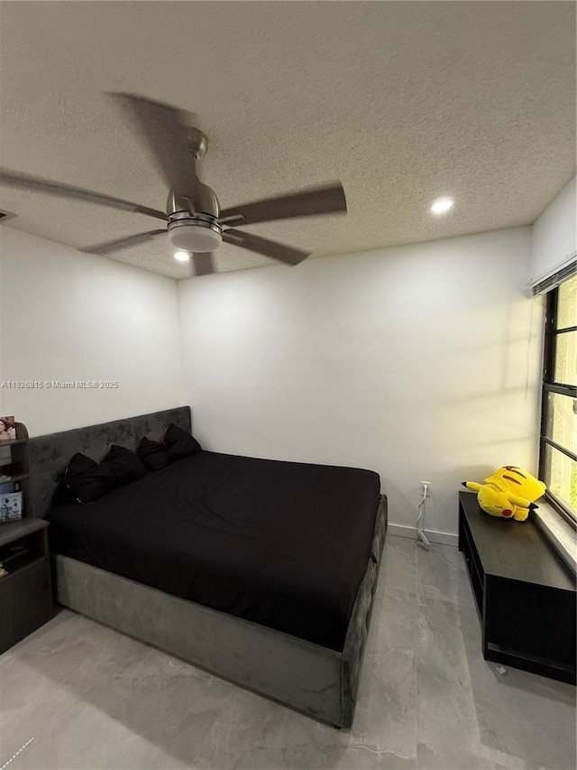 7440 SW 153rd Ct Unit 107-4, Miami, FL 33193 - bedroom featuring a textured ceiling, ceiling fan, and recessed lighting