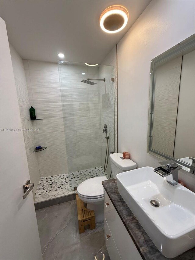 7440 SW 153rd Ct Unit 107-4, Miami, FL 33193 - bathroom featuring a walk in shower and vanity