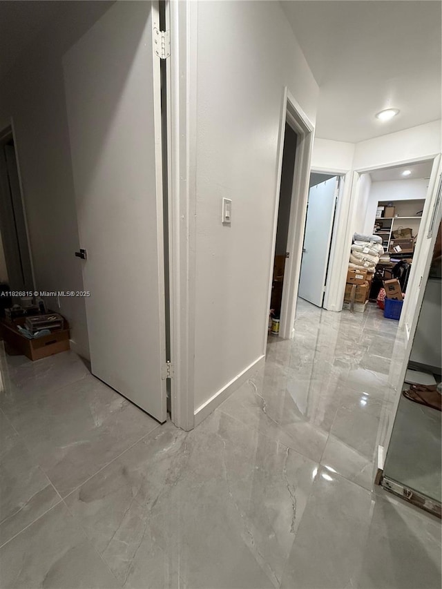 7440 SW 153rd Ct Unit 107-4, Miami, FL 33193 - hallway with marble finish flooring and baseboards