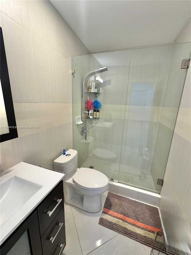 13261 SW 17th Ln, Miami, FL 33175 - full bathroom with vanity, a shower stall, and tile walls