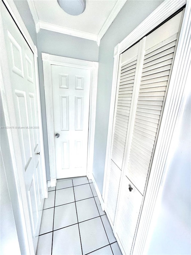 13261 SW 17th Ln, Miami, FL 33175 - corridor featuring ornamental molding and light tile patterned flooring