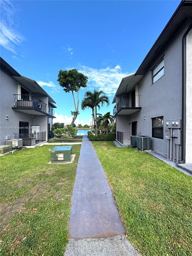 13261 SW 17th Ln, Miami, FL 33175 - view of green lawn with a balcony