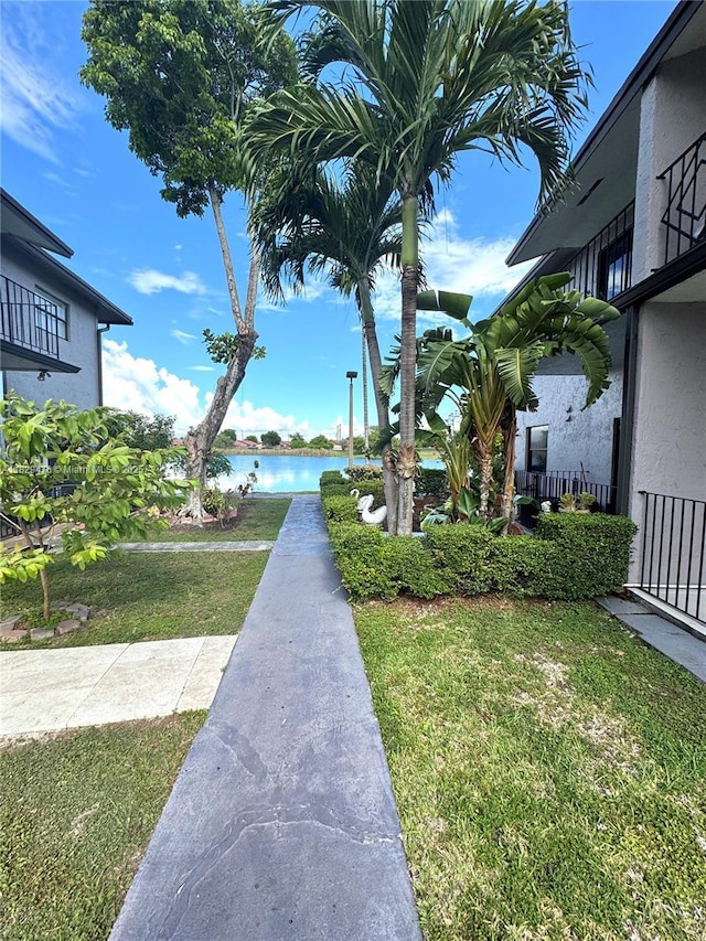 13261 SW 17th Ln, Miami, FL 33175 - view of green lawn with a water view