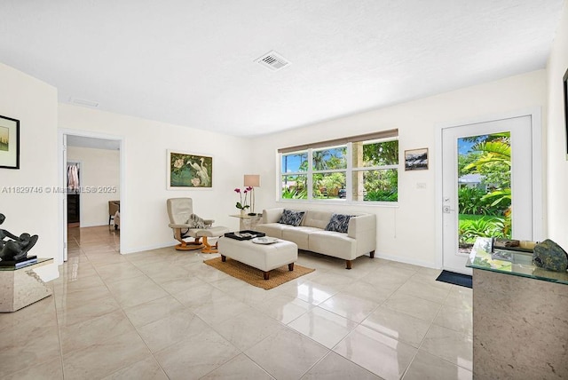 15730 SW 87th Ct, Palmetto Bay, FL 33157 - living area with baseboards and light tile patterned floors