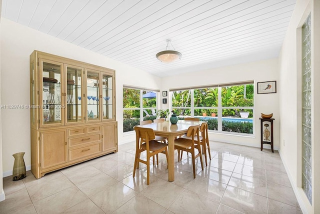 15730 SW 87th Ct, Palmetto Bay, FL 33157 - dining room with light tile patterned floors, wooden ceiling, and vaulted ceiling