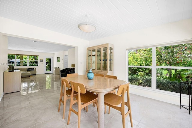 15730 SW 87th Ct, Palmetto Bay, FL 33157 - dining room featuring light tile patterned floors and wooden ceiling