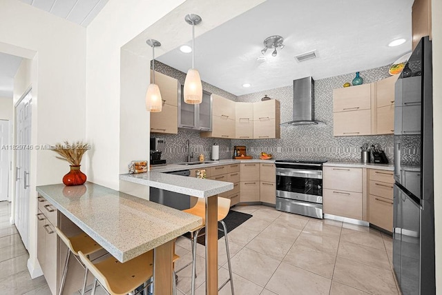 15730 SW 87th Ct, Palmetto Bay, FL 33157 - kitchen with appliances with stainless steel finishes, wall chimney range hood, a peninsula, tasteful backsplash, and recessed lighting