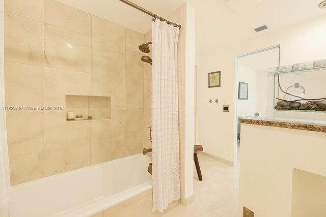 15730 SW 87th Ct, Palmetto Bay, FL 33157 - bathroom featuring shower / tub combo with curtain and tile patterned flooring