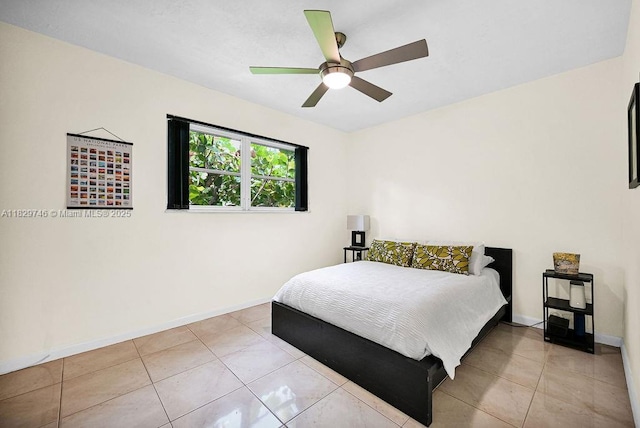 15730 SW 87th Ct, Palmetto Bay, FL 33157 - bedroom with ceiling fan and light tile patterned flooring