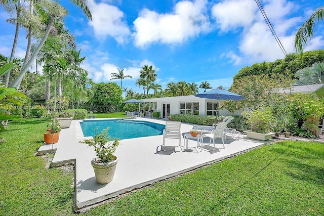 15730 SW 87th Ct, Palmetto Bay, FL 33157 - swimming pool featuring a patio and a yard
