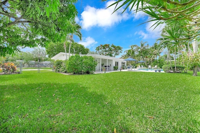 15730 SW 87th Ct, Palmetto Bay, FL 33157 - view of yard featuring a patio area and an outdoor pool
