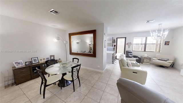 4231 SW 165th Ct, Miami, FL 33185 - dining space with a chandelier and light tile patterned flooring
