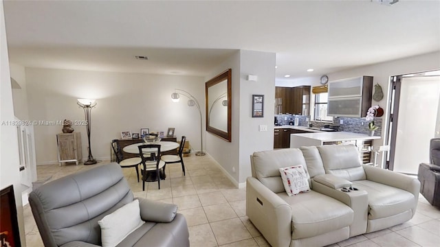 4231 SW 165th Ct, Miami, FL 33185 - living room with light tile patterned flooring and recessed lighting