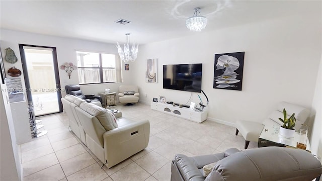 4231 SW 165th Ct, Miami, FL 33185 - living area with a chandelier and light tile patterned floors