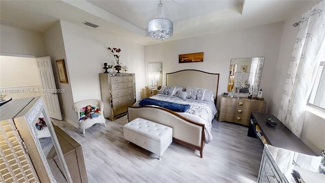 4231 SW 165th Ct, Miami, FL 33185 - bedroom featuring wood finished floors and a raised ceiling