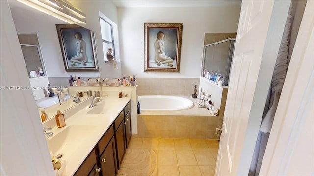 4231 SW 165th Ct, Miami, FL 33185 - bathroom with a stall shower, a garden tub, double vanity, and tile patterned floors
