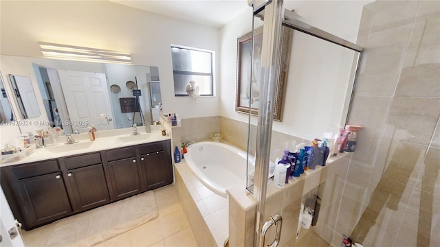4231 SW 165th Ct, Miami, FL 33185 - bathroom with a garden tub, a stall shower, double vanity, and tile patterned floors