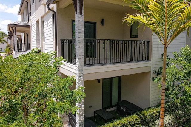 4269 NW 83rd Path, Doral, FL 33166 - view of side of home with stucco siding and a balcony