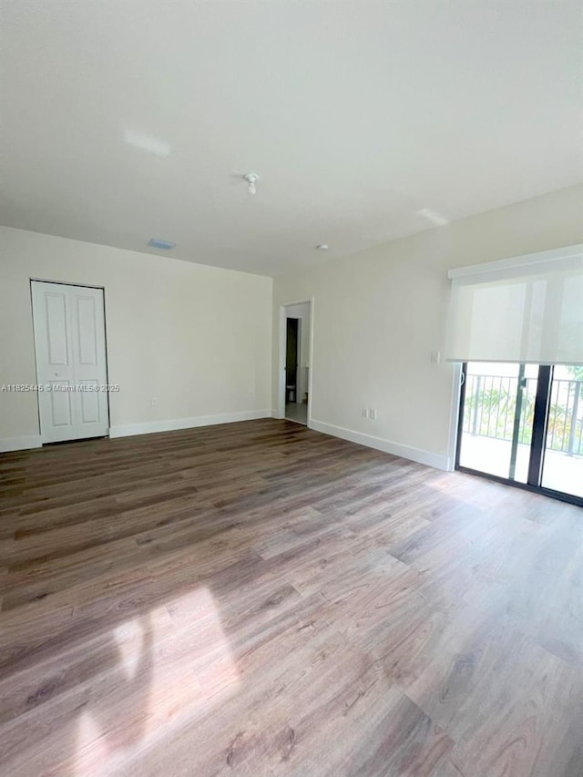 4269 NW 83rd Path, Doral, FL 33166 - unfurnished room with wood finished floors and baseboards