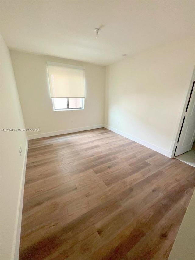 4269 NW 83rd Path, Doral, FL 33166 - empty room featuring light wood-type flooring and baseboards