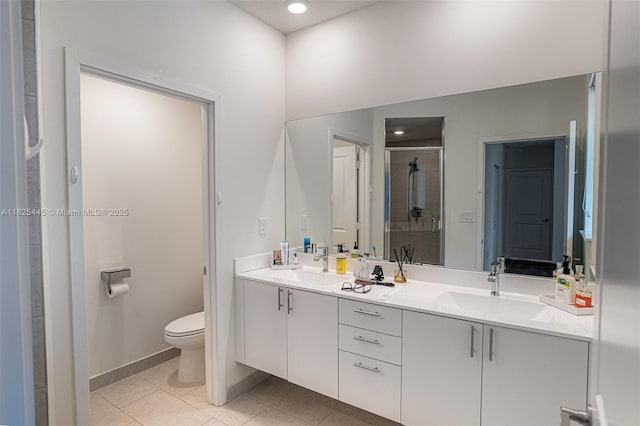 4269 NW 83rd Path, Doral, FL 33166 - bathroom featuring double vanity, a stall shower, tile patterned flooring, and recessed lighting
