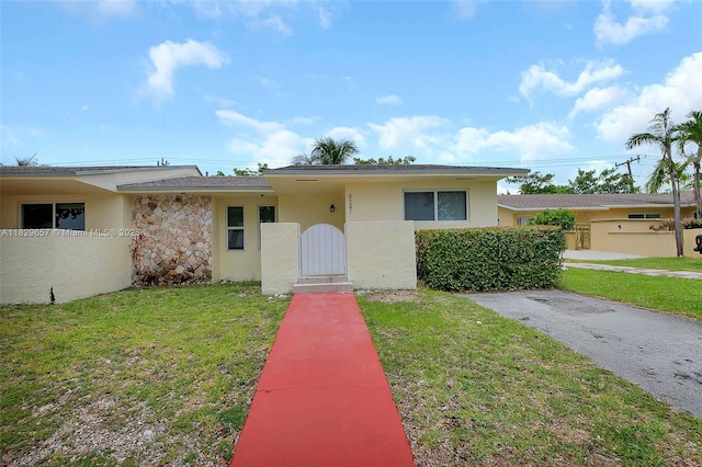 9241 SW 204th Ter, Cutler Bay, FL 33189 - view of front of property featuring stucco siding and a front yard