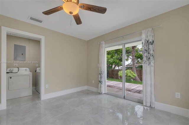 9241 SW 204th Ter, Cutler Bay, FL 33189 - empty room featuring washing machine and clothes dryer, ceiling fan, electric panel, and light marble finish floors