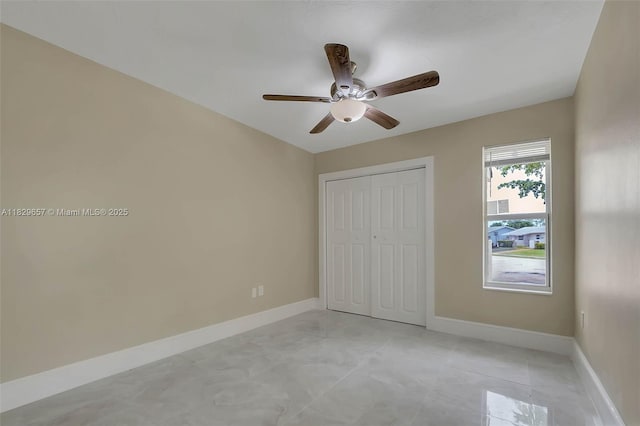 9241 SW 204th Ter, Cutler Bay, FL 33189 - unfurnished bedroom featuring a closet and ceiling fan