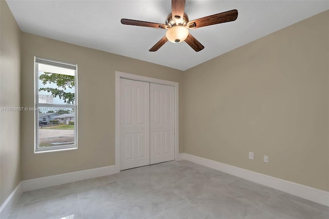 9241 SW 204th Ter, Cutler Bay, FL 33189 - unfurnished bedroom featuring a closet and ceiling fan