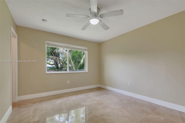 9241 SW 204th Ter, Cutler Bay, FL 33189 - empty room featuring a smoke detector, ceiling fan, and light marble finish floors