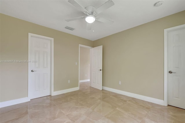 9241 SW 204th Ter, Cutler Bay, FL 33189 - unfurnished bedroom featuring ceiling fan and light marble finish floors