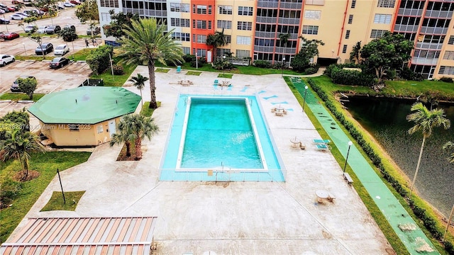 1780 NE 191st St Unit 704-2, Miami, FL 33179 - view of swimming pool with a water view