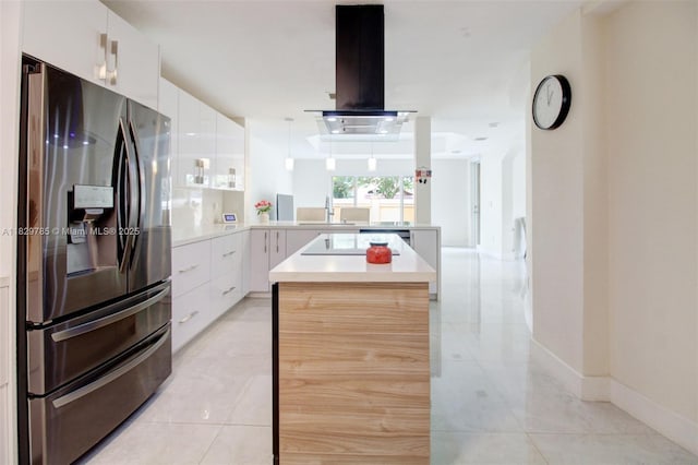 15445 SW 26th Ter, Miami, FL 33185 - kitchen featuring stainless steel fridge, island exhaust hood, a peninsula, and light tile patterned floors