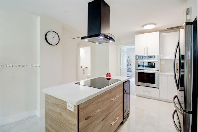 15445 SW 26th Ter, Miami, FL 33185 - kitchen with appliances with stainless steel finishes, island exhaust hood, white cabinets, modern cabinets, and light tile patterned flooring