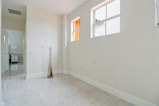 15445 SW 26th Ter, Miami, FL 33185 - spare room featuring baseboards and light tile patterned floors