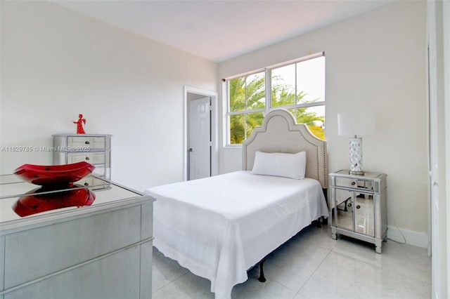 15445 SW 26th Ter, Miami, FL 33185 - bedroom with light tile patterned floors and baseboards
